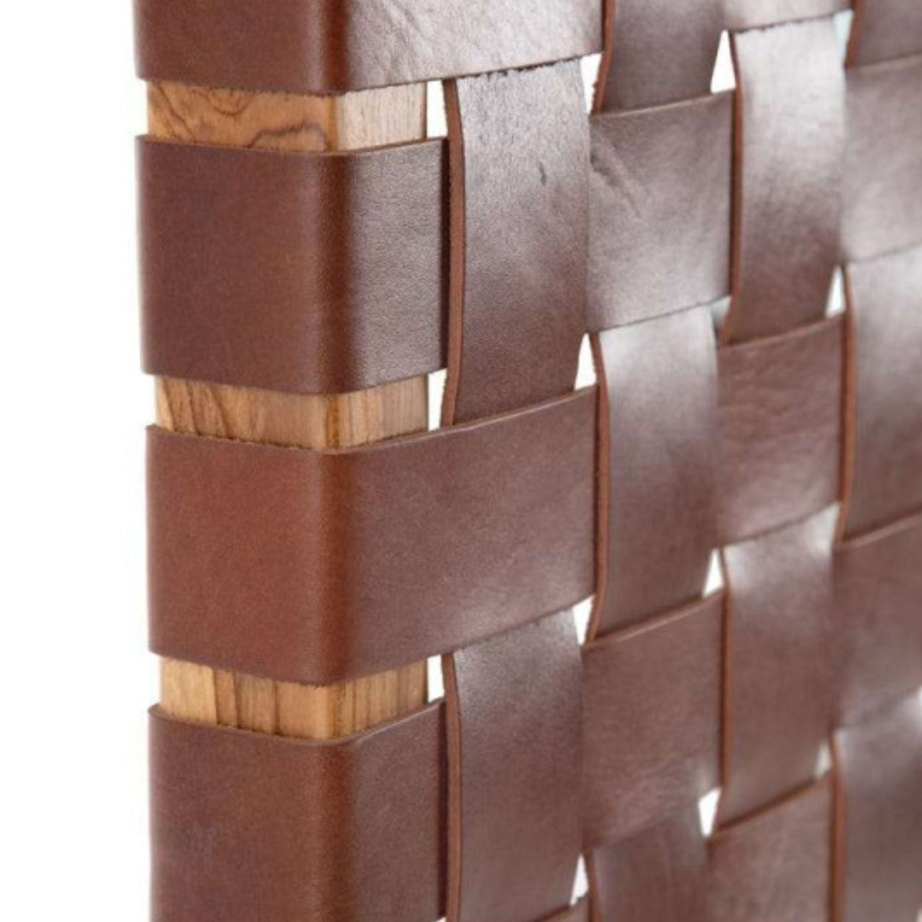 Artihandmade® headboard showing seamless connection of wood and full grain leather straps.